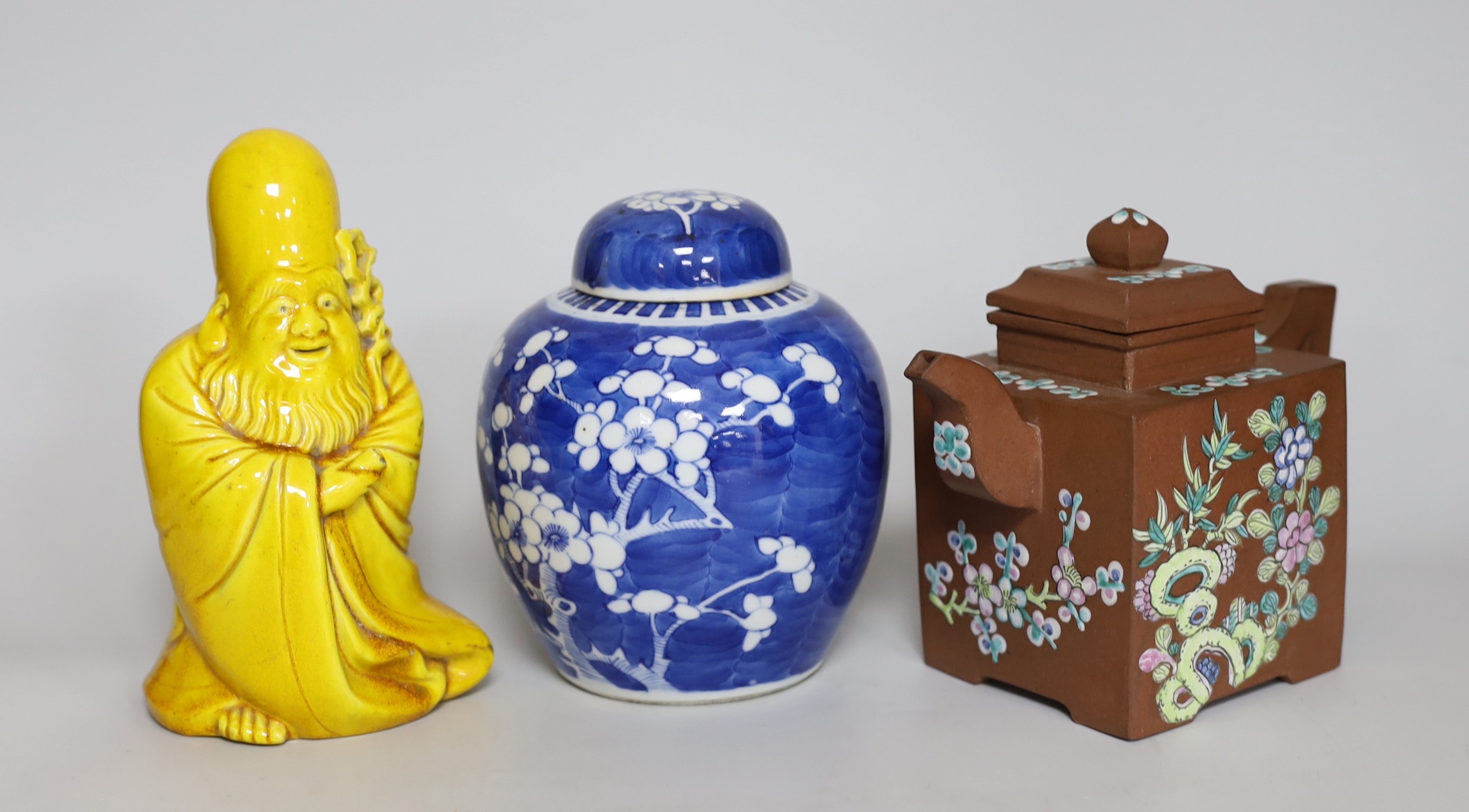 A Chinese prunus ginger jar, an enamelled Yixing teapot and a Japanese monochrome figure of Fukurokuji, tallest 18cm